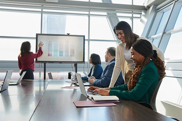 A group of people working together in a room