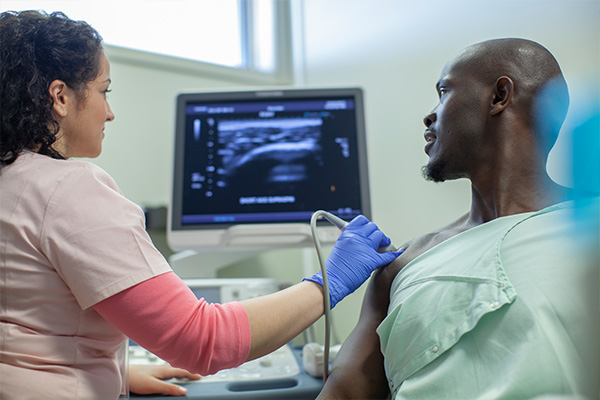 A man getting a shoulder ultrasound