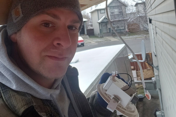 A man working in the electrical field
